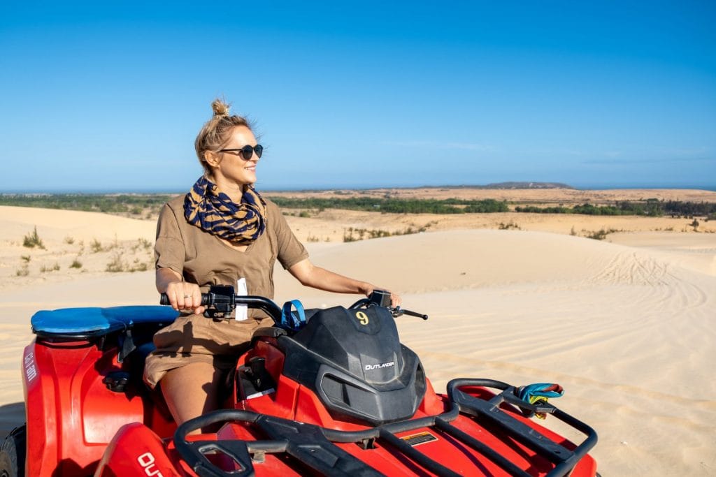 Girl on a quad bike in Mui Ne