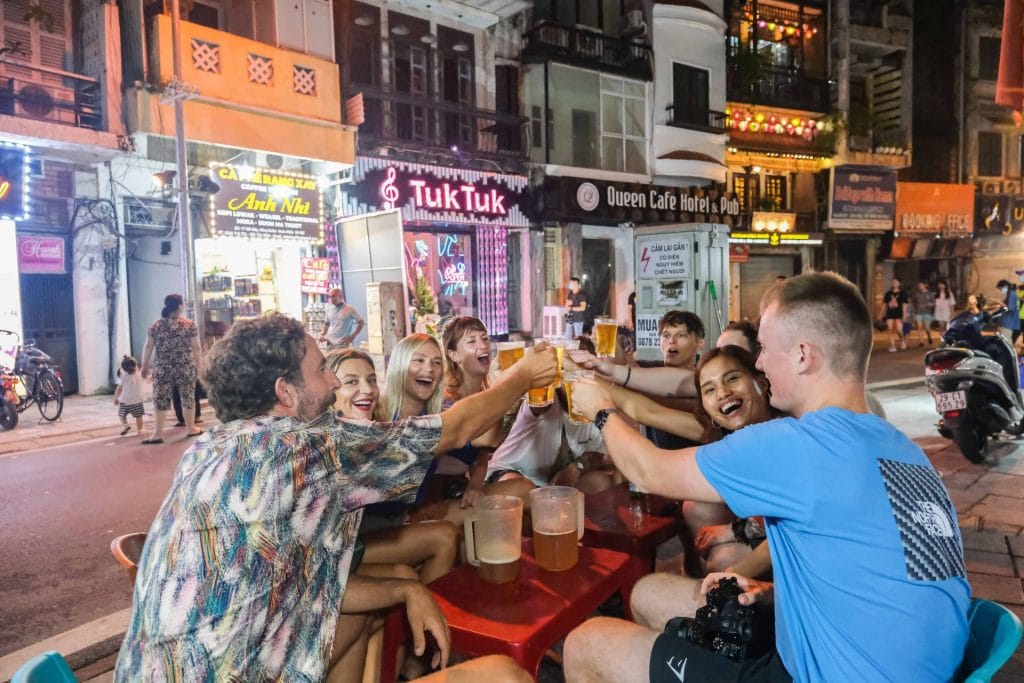 Group cheers with beers in Vietnam