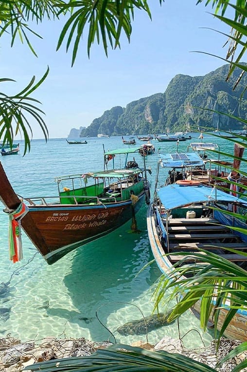 Thailand travel adventure: enjoying the scenery from a longtail boat on Phi Phi Island