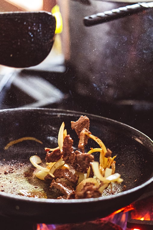  A picture of some Balinese food cooking in a pan 