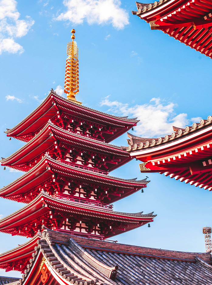 A close-up view of the five-story red pagoda at Sensō-ji Temple in Asakusa, Tokyo.
