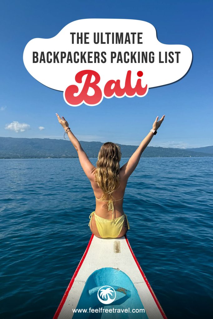 A woman in a yellow bikini raises her arms while sitting on the bow of a boat with text reading "The Ultimate Backpackers Packing List Bali."